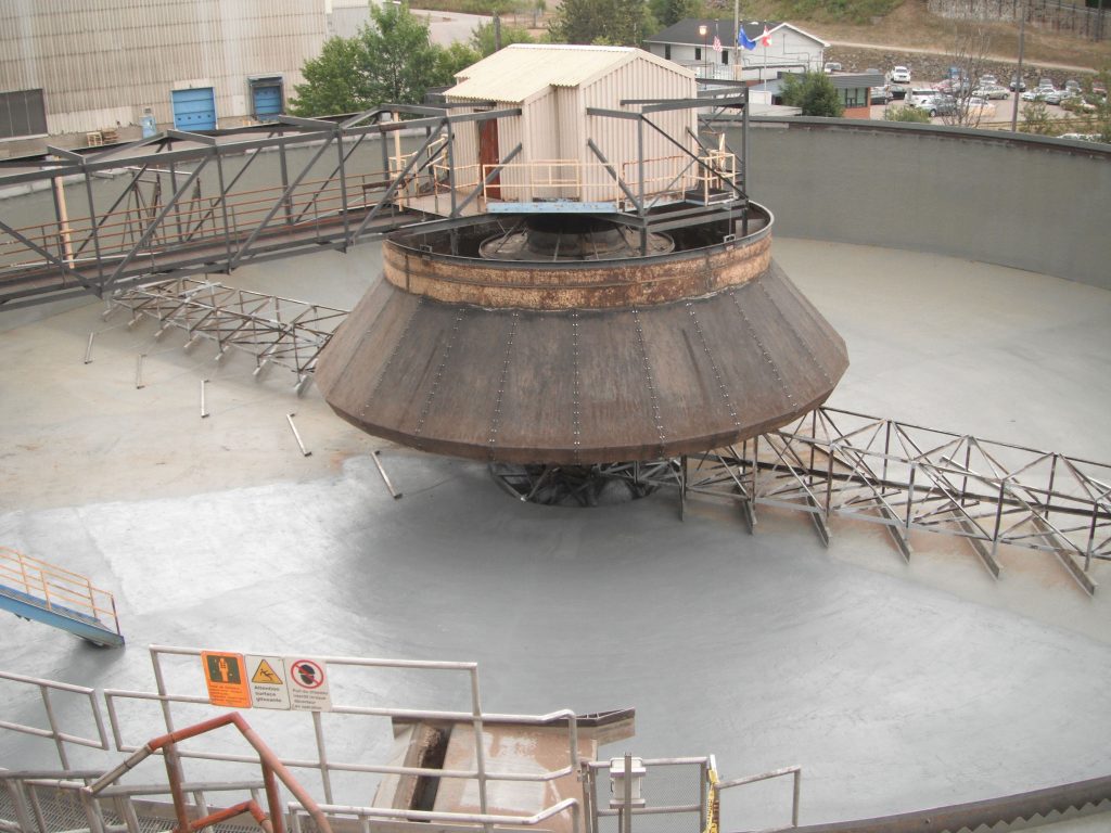 industrial wastewater clarifier protected with a corrosion resistant lining