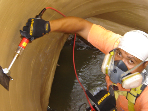 spark testing being preformed in a municipal wastewater manhole